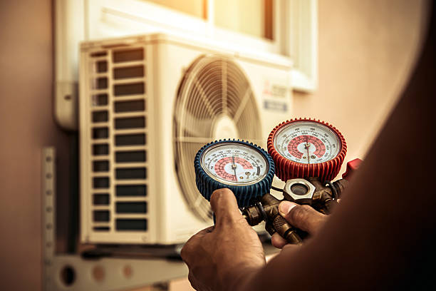 Professional Hvac technician working in Smithland, KY